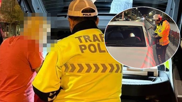 Kayseri'de ilginç görüntü! Yolun ortasında araçta uyuyakaldı, cezayla uyandı